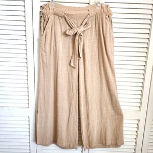 Pants, wide leg gauzy material, elastic an tie waist, size Medium
